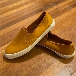 Mustard slip on sneakers